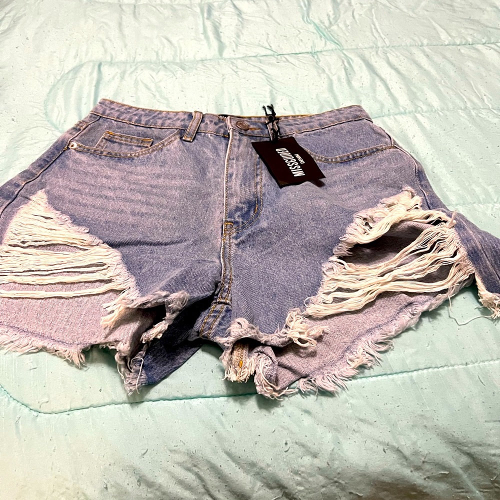 Misguided Women’s shark bite distressed shorts
